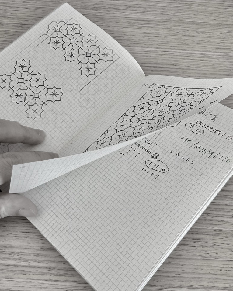 Hand-drawn pattern charts in a grid notebook